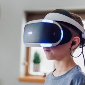 boy-wearing-white-and-black-vr-headset